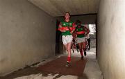 25 March 2001; Barry Whelahan of Birr walks on a disinfectent matt while making his way to the pitch before the Offaly County Senior Hurling Championship Final match between Birr and Seir Kieran at St Brendan's Park in Birr, Offaly. Photo by Brendan Moran/Sportsfile