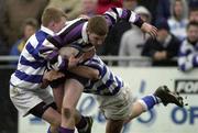 26 March 2001; Karl Douglas of Terenure College is tackled by David Cullen, left, and Diarmuid Laffan of Blackrock College during the Leinster Schools Schools Junior Cup Semi-Final match between  Blackrock College v Terenure College at Donnybrook Stadium in Dublin. Photo by Brendan Moran/Sportsfile