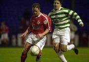 26 March 2001; Dessie Baker of Shelbourne in action against Pascal Vaudequin of Shamrock Rovers during the FAI Cup Quarter Final match between Shelbourne and Shamrock Rovers at Tolka Park in Dublin. Photo by Brendan Moran/Sportsfile
