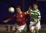 26 March 2001; Dessie Baker of Shelbourne in action against Pascal Vaudequin of Shamrock Rovers during the FAI Cup Quarter Final match between Shelbourne and Shamrock Rovers at Tolka Park in Dublin. Photo by Brendan Moran/Sportsfile