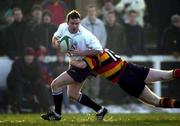 30 December 2000; John Kelly of Cork Constitution is tackled by Paul Barry of Lansdowne during the  AIB All-Ireland League Division 1 match between Cork Constitution RFC and Lansdowne RFC at Temple Hill in Cork. Photo by Brendan Moran/Sportsfile