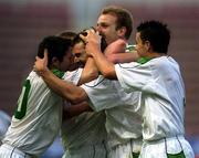 28 March 2001; Kevin Kilbane of Republic of Ireland celebrates scoring his side's second goal with team-mates including Robbie Keane, left, Gary Doherty, second from right, and Ian Harte, right, during the 2002 FIFA World Cup Qualifier match between Andorra and Republic of Ireland at the Mini Estadi in Barcelona, Spain. Photo by David Maher/Sportsfile