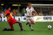 28 March 2001; Damien Duff of Republic of Ireland in action against Oscar Sonegro of Andorra during the 2002 FIFA World Cup Qualifier match between Andorra and Republic of Ireland at the Mini Estadi in Barcelona, Spain. Photo by Damien Eagers/Sportsfile