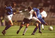 24 March 2001; David Connolly of Republic of Ireland in action against Marios Charalampous, left, and Georgis Theodotou of Cyprus during the 2002 FIFA World Cup Qualification Group 2 match between Cyprus and Republic of Ireland at GSP Stadium in Nicosia, Cyprus. Photo by David Maher/Sportsfile