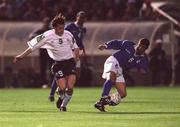 24 March 2001; Panagiotis Pounnas of Cyprus in action against David Connolly of Republic of Ireland during the 2002 FIFA World Cup Qualification Group 2 match between Cyprus and Republic of Ireland at GSP Stadium in Nicosia, Cyprus. Photo by Damien Eagers/Sportsfile