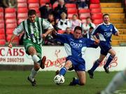 25 March 2001; Barry O'Connor of Bray Wanderers is tackled by Fergal Harkin of Finn Harps during the Eircom League Premier Division match between Bray Wanderers and Finn Harps at the Carlisle Grounds in Bray, Wicklow. Photo by Ray Lohan/Sportsfile