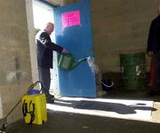 31 March 2001; &quot;Kinger&quot; Pat King, a member of the ground staff at Semple Stadium, sprays disinfectant on to a matt at an entrance in an effort to stop the spread of Foot and Mouth Disease before the AIB All-Ireland Senior Club Hurling Championship Semi-Final Replay match between Graigue Ballycallan and Sixmilebridge at Semple Stadium in Thurles, Tipperary. Photo by Ray McManus/Sportsfile