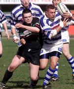 31 March 2001; Justin Fitzpatrick of Dungannon is tackled by S Stephens of DLSP during the AIB All-Ireland League Division 1 match between Dungannon RFC and DLSP RFC at Stevenson Park in Dungannon, Tyrone. Photo by Sportsfile