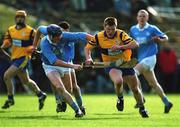 31 March 2001; Niall Gilligan of Sixmilebridge races past Paddy O'Dwyer of Graigue Ballycallan during the AIB All-Ireland Senior Club Hurling Championship Semi-Final Replay match between Graigue Ballycallan and Sixmilebridge at Semple Stadium in Thurles, Tipperary. Photo by Ray McManus/Sportsfile