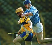 31 March 2001; Robert Conlon of Sixmilebridge is tackled by Paddy O'Dwyer of Graigue Ballycallan during the AIB All-Ireland Senior Club Hurling Championship Semi-Final Replay match between Graigue Ballycallan and Sixmilebridge at Semple Stadium in Thurles, Tipperary. Photo by Ray McManus/Sportsfile