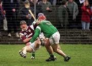 1 April 2001; Ollie Fahy of Galway is tackled by TJ Ryan of Limerick during the Allianz National Hurling League Division 1A Round 4 match between Galway and Limerick at Duggan Park in Ballinasloe, Galway. Photo by Damien Eagers/Sportsfile