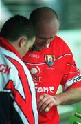 1 April 2001; Brian Corcoran of Cork examines his hand after leaving the field with an injury during the Allianz GAA National Hurling League Division 1B Round 4 match between Wexford and Cork at at Bellefield in Enniscorthy, Wexford. Photo by Aoife Rice/Sportsfile
