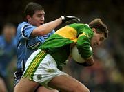 1 April 2001; Maurice Fitzgerald of Kerry holds off the challenge of Jonathan Magee of Dublin during the Allianz National Football League Division 1 match between Kerry and Dublin at Fitzgerald Stadium in Killarney, Kerry. Photo by Brendan Moran/Sportsfile