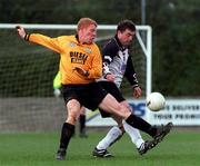 1 April 2001; Declan Dolan of Portmarnock in action against John Ryan of Dundalk during the FAI Lager Cup Third Round match between Portmarnock and Dundalk at John Hyland Park in Dublin. Photo by David Maher/Sportsfile
