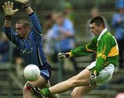 1 April 2001; Aodán Mac Gearailt of Kerry shoots for a point despite the attentions of Martin Cahill of Dublin during the Allianz National Football League Division 1 match between Kerry and Dublin at Fitzgerald Stadium in Killarney, Kerry. Photo by Brendan Moran/Sportsfile