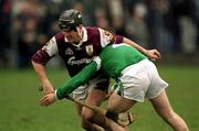 1 April 2001; Ollie Fahy of Galway is tackled by Damien Reale of Limerick during the Allianz National Hurling League Division 1A Round 4 match between Galway and Limerick at Duggan Park in Ballinasloe, Galway. Photo by Damien Eagers/Sportsfile