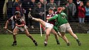 1 April 2001; Ollie Fahy of Galway is tackled by TJ Ryan of Limerick, supported by team-mate Alan Kerins, left, during the Allianz National Hurling League Division 1A Round 4 match between Galway and Limerick at Duggan Park in Ballinasloe, Galway. Photo by Damien Eagers/Sportsfile