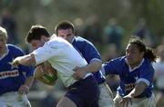 31 March 2001; Cian Mahony of Cork Constitution is tackled by Shane Jennings and Eddie Hekenui of St Mary's during the AIB All-Ireland League Division 1 match between Cork Constitution RFC and St Mary's RFC at Temple Hill in Cork. Photo by Matt Browne/Sportsfile
