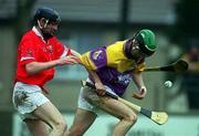 1 April 2001; Barry Goff of Wexford in action against Pat Mulcahy of Cork during the Allianz GAA National Hurling League Division 1B Round 4 match between Wexford and Cork at at Bellefield in Enniscorthy, Wexford. Photo by Aoife Rice/Sportsfile