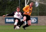 1 March 2001; Joe Feeney of Portmarnock in action against Ian Hill of Dundalk during the FAI Lager Cup Third Round match between Portmarnock and Dundalk at John Hyland Park in Dublin. Photo by David Maher/Sportsfile