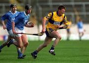 31 March 2001; Niall Gilligan of Sixmilebridge in action against Michael Hoyne of Graigue Ballycallan during the AIB All-Ireland Senior Club Hurling Championship Semi-Final Replay match between Graigue Ballycallan and Sixmilebridge at Semple Stadium in Thurles, Tipperary. Photo by Ray McManus/Sportsfile