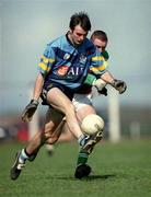 4 April 2001; David Hannify of UCD is tackled by Stephen O'Neill of St Mary's during the Sigerson Cup match between UCD and St Mary's at Walterstown GFC in Navan, Meath. Photo by Aoife Rice/Sportsfile