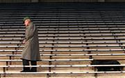 31 March 2001; An elderly supporter prepares to take his seat in the stand before the AIB All-Ireland Senior Club Hurling Championship Semi-Final Replay match between Graigue Ballycallan and Sixmilebridge at Semple Stadium in Thurles, Tipperary. Photo by Ray McManus/Sportsfile
