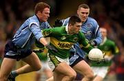 1 April 2001; Aodán Mac Gearailt of Kerry in action against Peadar Andrews, left, and Ciarán Whelan of Dublin during the Allianz National Football League Division 1 match between Kerry and Dublin at Fitzgerald Stadium in Killarney, Kerry. Photo by Brendan Moran/Sportsfile