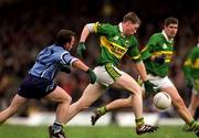 1 April 2001; Tomas Ó Sé of Kerry gets away from Niall O'Donoghue of Dublin during the Allianz National Football League Division 1 match between Kerry and Dublin at Fitzgerald Stadium in Killarney, Kerry. Photo by Brendan Moran/Sportsfile