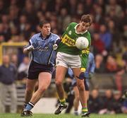 1 April 2001; Maurice Fitzgerald of Kerry is tackled by Jonathan Magee of Dublin during the Allianz National Football League Division 1 match between Kerry and Dublin at Fitzgerald Stadium in Killarney, Kerry. Photo by Brendan Moran/Sportsfile