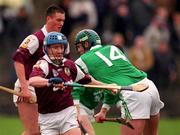 1 April 2001; Ollie Canning of Galway is tackled by Brian Begley of Limerick during the Allianz National Hurling League Division 1A Round 4 match between Galway and Limerick at Duggan Park in Ballinasloe, Galway. Photo by Damien Eagers/Sportsfile