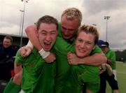 7 April 2001; Glenanne players, from left, John Goulding, Graham Shaw and Joe Brennan, Glenanne, celebrate after the Irish Senior Cup Hockey Final match between YMCA and Glenanne at the National Hockey Stadium in Belfield, UCD, Dublin. Photo by Ray Lohan/Sportsfile