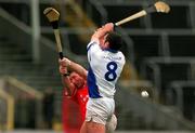 8 April 2001; Peter Queally of Waterford in action against Mark Landers of Cork during the Allianz GAA National Hurling League Division 1B Round 4 match between Cork and Waterford at Páirc Uí Chaoimh in Cork. Photo by David Maher/Sportsfile