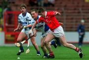 8 April 2001; Mark Landers of Cork in action against Ken McGrath and Tony Browne, left, of Waterford during the Allianz GAA National Hurling League Division 1B Round 4 match between Cork and Waterford at Páirc Uí Chaoimh in Cork. Photo by David Maher/Sportsfile