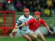 8 April 2001; Seánie McGrath of Cork in action against Stephen Frampton of Waterford during the Allianz GAA National Hurling League Division 1B Round 4 match between Cork and Waterford at Páirc Uí Chaoimh in Cork. Photo by David Maher/Sportsfile