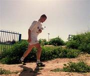21 March 2001; Roy Keane makes his way to a Republic of Ireland training session in Limassol, Cyprus. Photo by Damien Eagers/Sportsfile