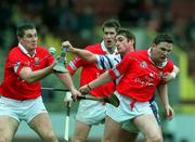 8 April 2001; Tony Browne of Waterford in action against Cork players, from left, Fergal McCormack, Mark Landers, and Michael O'Conell during the Allianz GAA National Hurling League Division 1B Round 4 match between Cork and Waterford at Páirc Uí Chaoimh in Cork. Photo by David Maher/Sportsfile