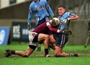 8 April 2001; Jonathan Magee of Dublin is tackled by Joe Bergin of Galway during the Allianz GAA National Football League Division 1A match between Dublin and Galway at Parnell Park in Dublin. Photo by Ray McManus/Sportsfile