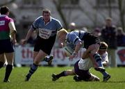 7 April 2001; Bryan Shelbourne, Galwegians, supported by team-mate Peter Bracken, is tackled by Mick O'Driscoll, Cork Con. AIB All-Ireland League, Galwegians v Cork Constitution, Crowley Park, Galway. Rugby. Picture credit; Brendan Moran / SPORTSFILE *(EDI)*
