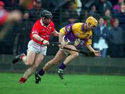 1 April 2001; Rory McCarthy, Wexford in action against Wayne Sherlock, Cork. Wexford v Cork, National Hurling League, Belfield, Enniscorthy, Co. Wexford. Picture credit; Aoife Rice / SPORTSFILE