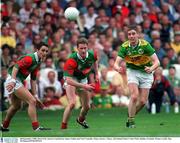 28 September 1997; Darragh O Se, Kerry, is tackled by James Nallen and Noel Connelly, Mayo. Kerry v Mayo, All Ireland Final, Croke Park, Dublin, Football. Picture credit; Ray McManus / SPORTSFILE