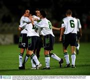 24 March 2000; From (l to r) are Gary Kelly, Republic of Ireland is congratulated by teammates Robbie Keane, (10), Steve Finnan, Mark Kinsella and Roy Keane after scoring Ireland's third goal, World Cup Qualifier, Cyprus v Rep of Ireland, GSP Stadium, Nicisia, Cyprus, Soccer. Picture credit; Damien Eagers / SPORTSFILE
