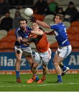 6 February 2016; Mark Shields. Armagh, in action against Gareth Dillon and Darren Strong, Laois. Allianz Football League, Division 2, Round 2, Armagh v Laois. Athletic Grounds, Armagh. Picture credit: Oliver McVeigh / SPORTSFILE