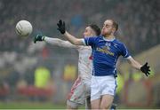 31 January 2016; Paul O'Connor, Cavan, in action against Cathal McCarron,  Tyrone. Allianz Football League, Division 2, Round 1, Tyrone v Cavan, Healy Park, Omagh, Co. Tyrone. Picture credit: Oliver McVeigh / SPORTSFILE