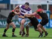 9 February 2016; Edward Carroll, Clongowes Wood College, is tackled by Robert Jordan, left, Zach Sattar and Alex Holmes, right, CBC Monkstown. Bank of Ireland Leinster Schools Senior Cup 2nd Round, Clongowes Wood College v CBC Monkstown. Donnybrook Stadium, Donnybrook, Dublin. Picture credit: Brendan Moran / SPORTSFILE