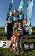 10 February 2016; Members of the Loreto Kilkenny Minor Girls team pose on the podium after winning the Minor Girls 1500m team award at the GloHealth Leinster Schools' Cross Country. Santry Demesne, Dublin. Picture credit: Seb Daly / SPORTSFILE