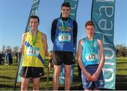 10 February 2016; First place Louis O'Loughlin, Moyle Park, centre, second place Cormac Canning, St Mary's Dheda, left, and third place Shane Fleming, Rochfortbridge, after competing in the Junior Boys 3000m at the GloHealth Leinster Schools' Cross Country. Santry Demesne, Dublin. Picture credit: Seb Daly / SPORTSFILE