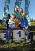 10 February 2016; Members of the Skerries Community College Junior Girls team pose on the podium after winning the Junior Girls 2000m team award at the GloHealth Leinster Schools' Cross Country. Santry Demesne, Dublin. Picture credit: Seb Daly / SPORTSFILE