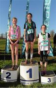 10 February 2016; First place Roisin Treacey, St Gerards, centre, second place Dearbhile O'Reilly, Mount Sackville, left, and third place Jennifer McAdams, HFCS Rathcoole, after competing in the Junior Girls 2000m at the GloHealth Leinster Schools' Cross Country. Santry Demesne, Dublin. Picture credit: Seb Daly / SPORTSFILE