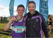 10 February 2016; Jack O'Leary, Clongowes Wood, poses with his coach Shane Heslin after winning the Senior Boys 6000m at the GloHealth Leinster Schools' Cross Country. Santry Demesne, Dublin. Picture credit: Seb Daly / SPORTSFILE